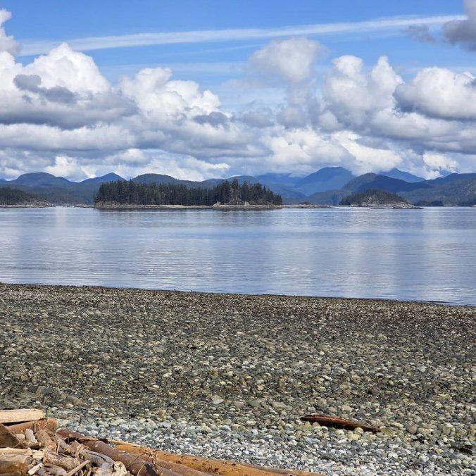 The view of the mountains and Discovery Island and pacific ocean from Rebecca Spit on a nice Spring day on Quadra Island.